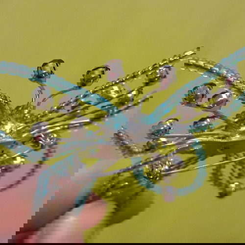 Καρφίτσα πεταλούδα μεταχειρισμένη σε γαλάζιες αποχρώσεις