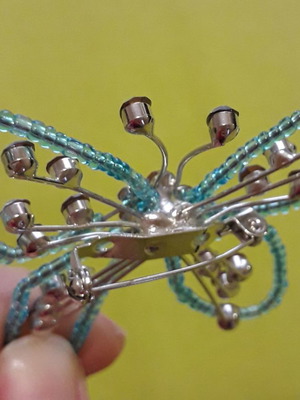 Καρφίτσα πεταλούδα μεταχειρισμένη σε γαλάζιες αποχρώσεις