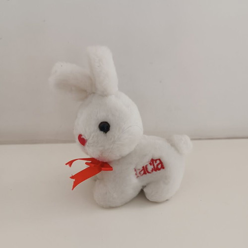 Lacta white plush bunny with red bow