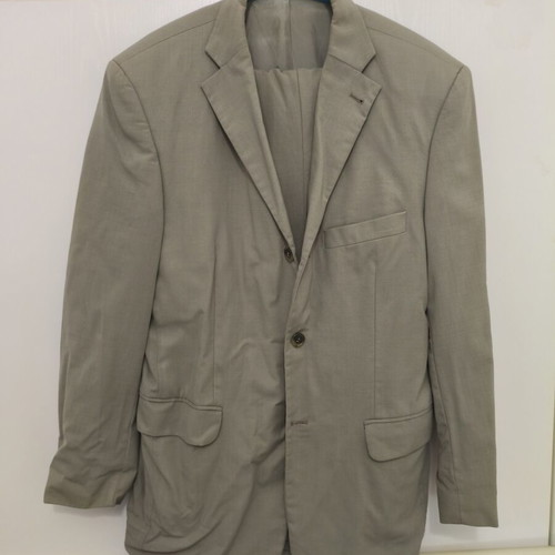 Suit used, beige jacket and trousers