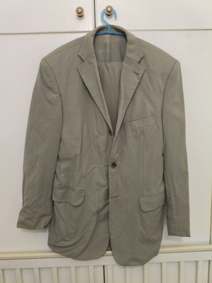 Suit used, beige jacket and trousers