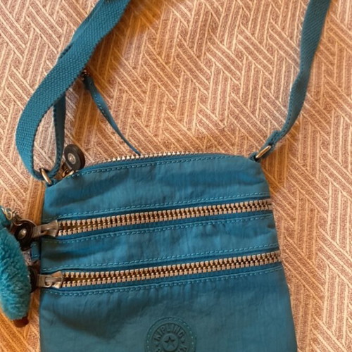Kipling small crossbody bag like new, petrol color with keychain