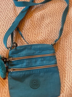 Kipling small crossbody bag like new, petrol color with keychain
