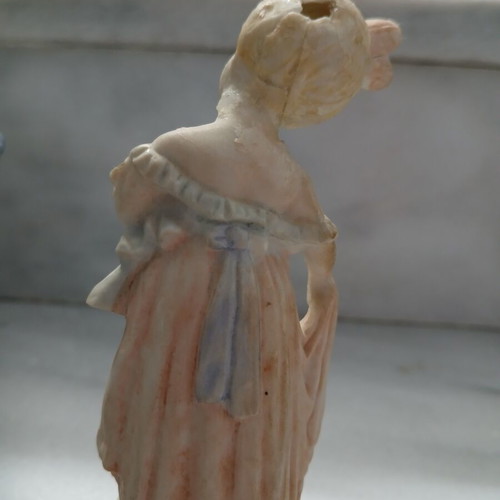 Vintage decorative figurine small lady with atmospheric details