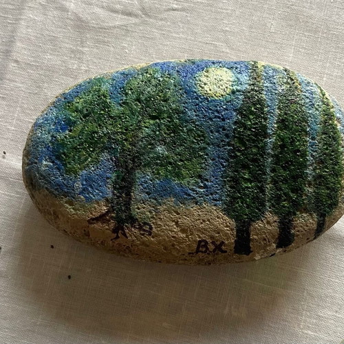 Large painted pebble with night landscape, cypress and olive