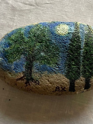 Large painted pebble with night landscape, cypress and olive
