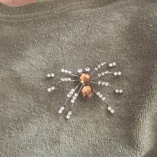 Spider brooch like new with rhinestones and gold crystals