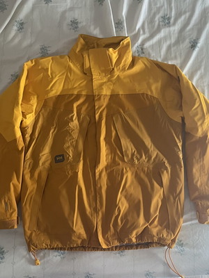 Helly Hansen jacket used, waterproof, warm, size L, yellow and orange