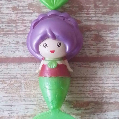 Bath mermaid toy used, wind-up swimming figure with tail movement