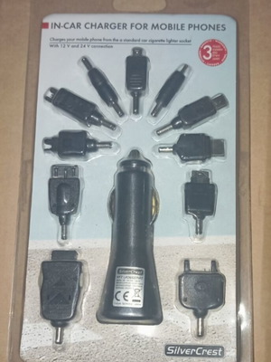 Car Charger set with 11 adapters new, includes cables