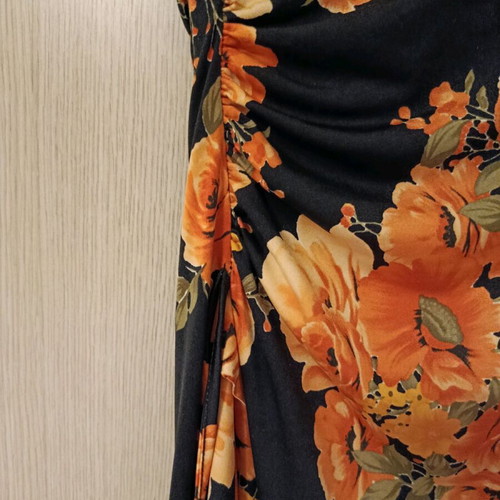 Dress black with orange flowers used, elastic, Spanish style hem