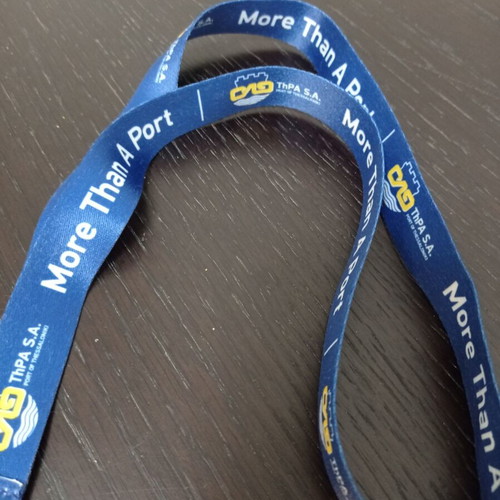 More Than A Port key lanyard used, blue and yellow
