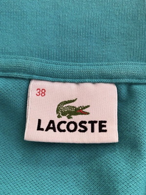 Lacoste sleeveless turquoise top, size medium