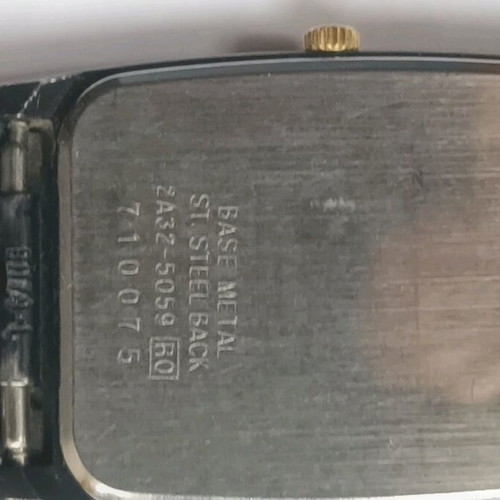 Seiko 2A32-5059 wristwatch used with black bracelet