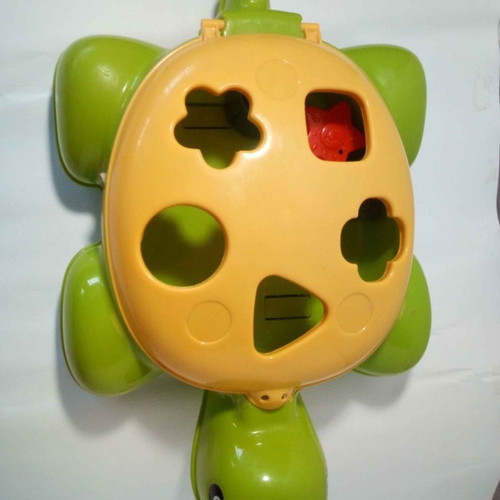 Interactive turtle toy Fisher Price used with shapes