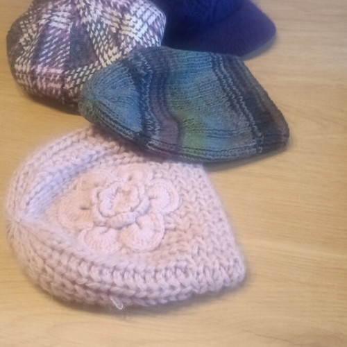 Winter hats and knit caps like new, multicolored