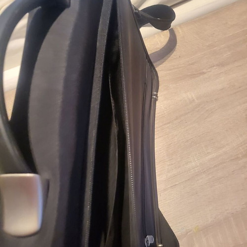 Delsey briefcase like new, black with multiple compartments