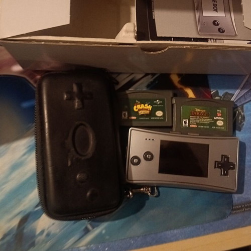 Game Boy Micro like new with 3 games, original packaging and charger