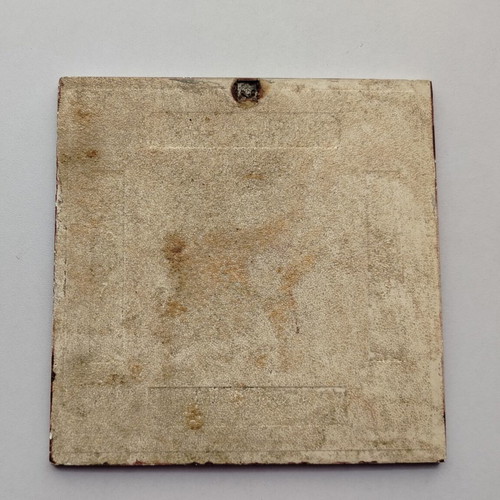 Ceramic tile used with small chips and slight color fading