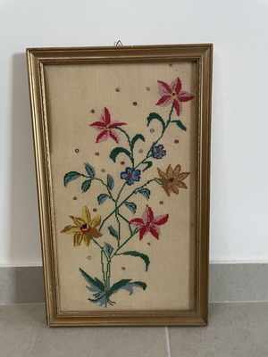 Vintage elongated frame with handmade embroidery used, colorful wildflowers