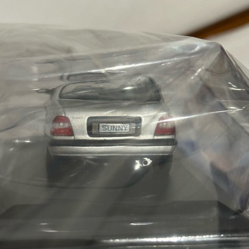 Unforgettable Cars Magazine with 1992 Nissan Sunny Silver 1:43 Scale like new
