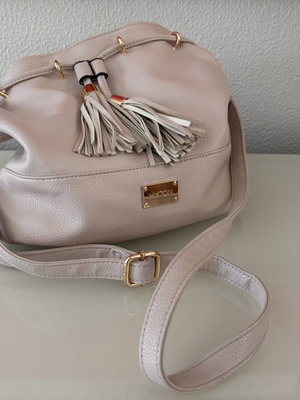Nolah shoulder bag like new, nude color with tassels