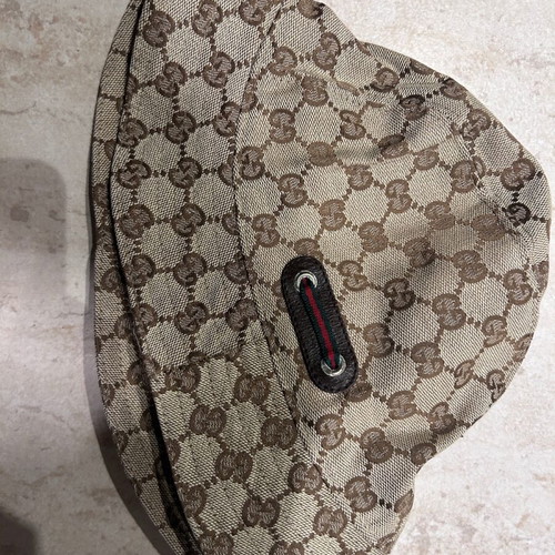 Gucci hat like new with metal details and brown lining