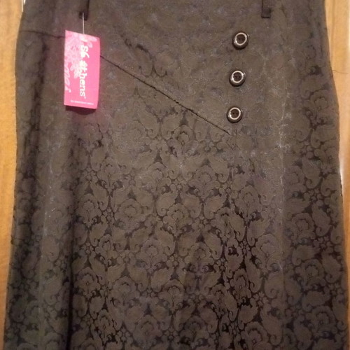 Midi evaze skirt used, winter with embossed brown pattern