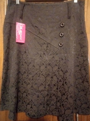 Midi evaze skirt used, winter with embossed brown pattern