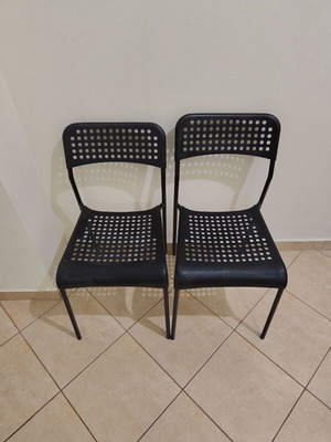 Plastic chairs like new, set of 2, black