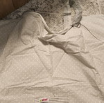 Nursing cover with storage pouch used