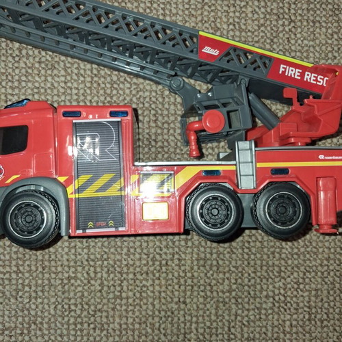 Set of remote control children's vehicles used, excavator and fire truck