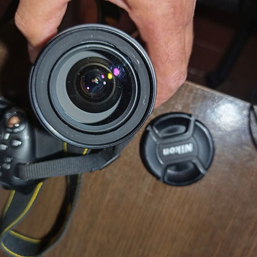 Nikon D5200 DSLR with Nikkor 35mm f/1.8G lens and accessories