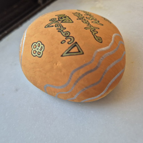 Decorative stone with tempera and metallic acrylics, new