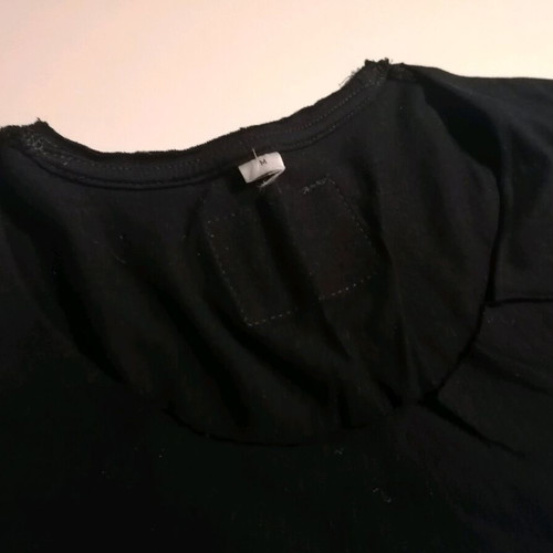 Vagrancy T-shirt size M black like new with low neckline