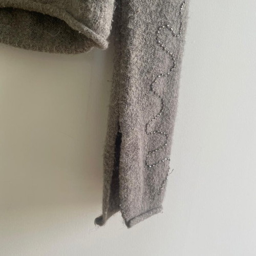 Gray knitted sweater with rhinestones used, asymmetric hem