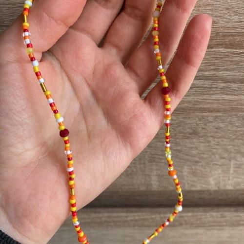 Handmade necklace colorful in red, orange and yellow