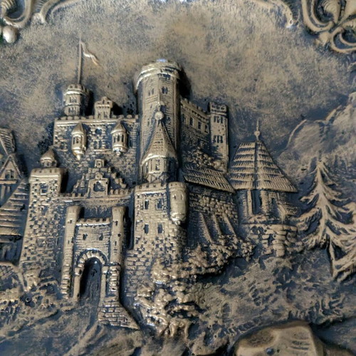 Decorative ceramic plate used with embossed design