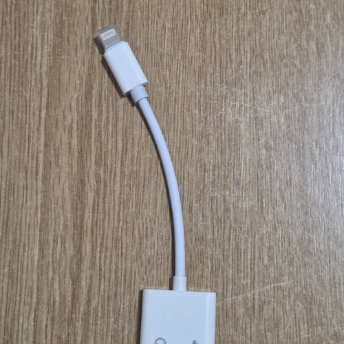 White 2-in-1 audio adapter with Lightning connector for iPhone, new