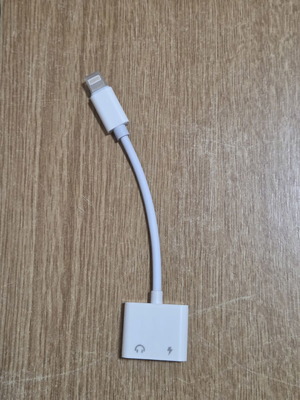 White 2-in-1 audio adapter with Lightning connector for iPhone, new