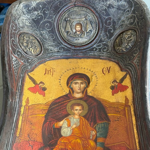 Handmade wooden trough with Orthodox icon used