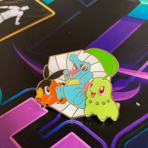 Pokemon coin pin like new with Chikorita, Tepig and Totodile