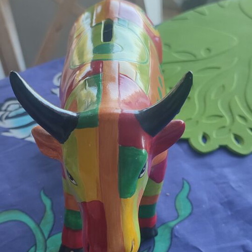 Painted cow-shaped piggy bank from Mexico like new