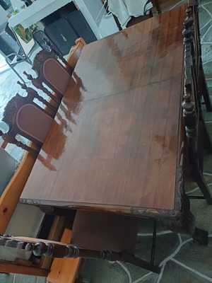 Antique dining table with lion legs and 6 carved chairs, pre-1950
