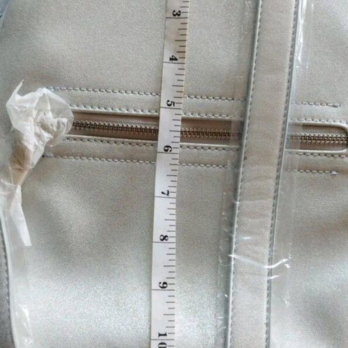 Parfois women's silver backpack new with tag