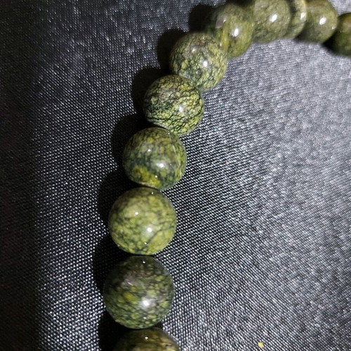 Decorative worry beads from semi-precious spiral stone
