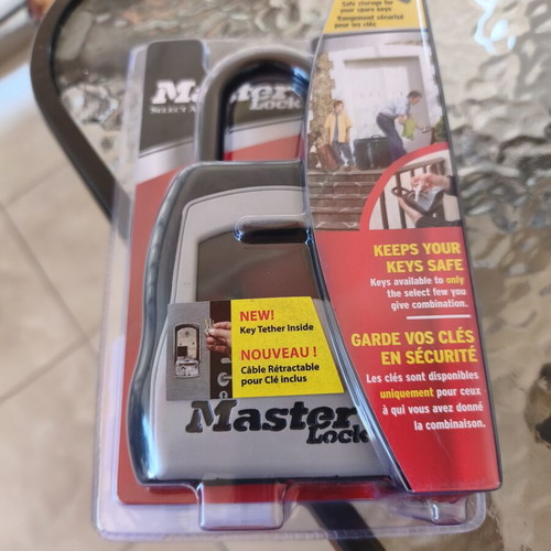 Master Lock padlock with key storage and combination