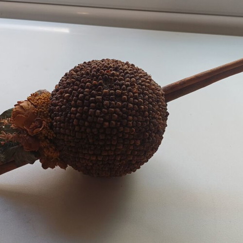 Decorative cinnamon wood and cloves ornament used