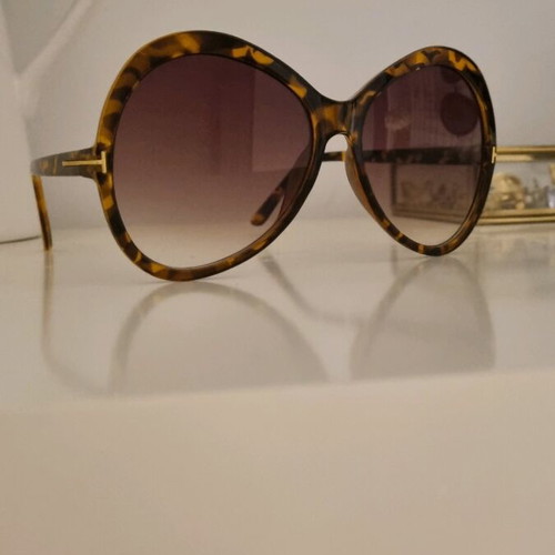 Sunglasses like new, brown-black with gold detail, oversized