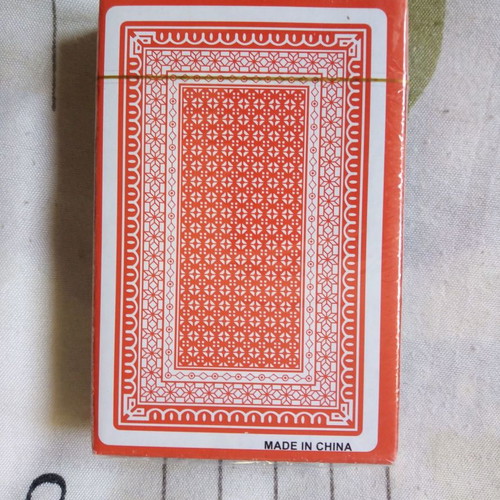Playing cards new in sealed pack with 54 cards
